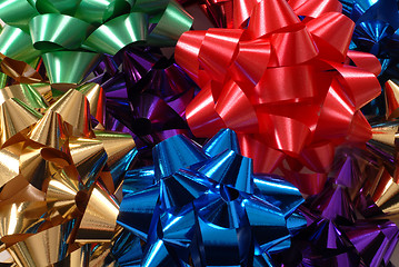 Image showing Colorful Christmas bows forming a vivid background