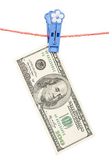 Image showing One hundred dollar on clothesline