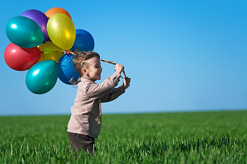 Image showing Child with balloons