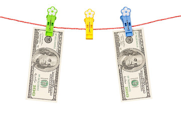 Image showing One hundred dollar on clothesline