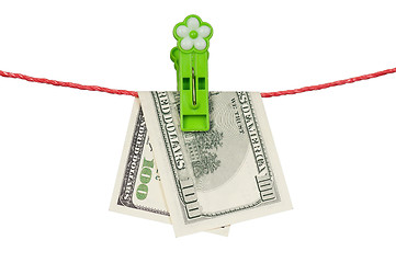 Image showing One hundred dollar on clothesline