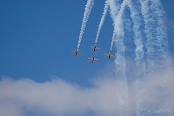 Image showing four planes in formation with vapour trails