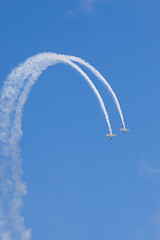 Image showing two planes loop the loop