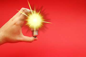 Image showing Background with lit lightbulb