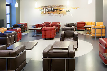 Image showing Interior of fashionable modern cafe with leather furniture