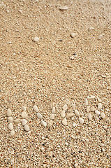 Image showing HVAR word made of pebbles