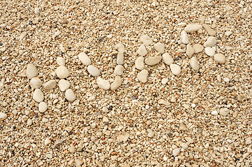 Image showing HVAR word made of pebbles