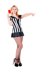 Image showing Attractive referee showing red card