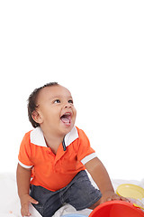 Image showing Adorable 1 year old hispanic boy with a big smile looking up