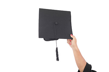 Image showing hand throwing graduation hats in the air 