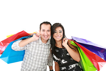 Image showing couple with shopping bags isolated on white 