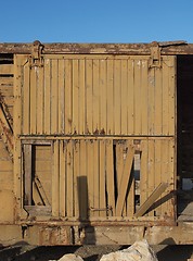 Image showing Broken door of abandoned wooden railway car 