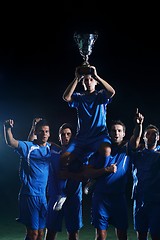 Image showing soccer players celebrating victory