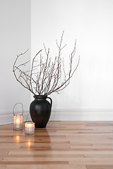 Image showing Lanterns and tree branches decorating a room