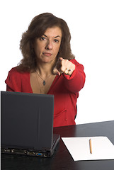 Image showing woman at desk pointin