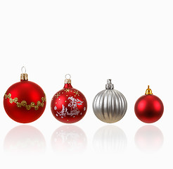 Image showing Collection of four Christmas balls on white