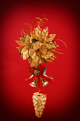 Image showing christmas decoration with cone , bells and golden flower