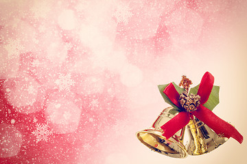 Image showing red christmas background with golden bels