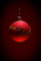 Image showing red christmas ball on dark background