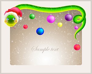 Image showing Cute snake (symbol of 2013 year) in Santa's hat. Greeting card with a snake in a hat santa.