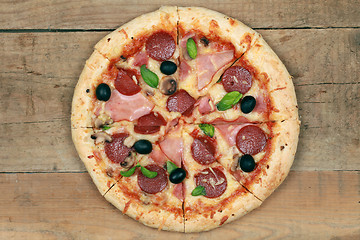 Image showing Pizza with ham and pepperoni