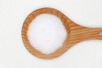 Image showing Sugar on a wooden spoon