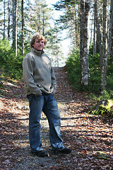 Image showing Man taking a walk in a forest