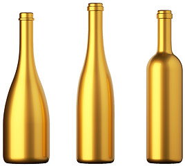 Image showing Three golden bottles for wine or beverages isolated