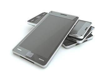 Image showing Stack of smart phones with touch screen over white