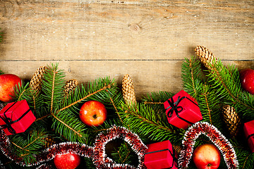 Image showing christmas fir tree with pinecones, apples and decorations 