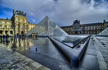 Image showing PARIS - NOV 16: Louvre Pyramid reflects on Water on November, 16