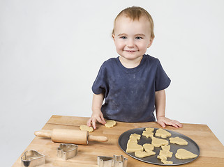 Image showing child making cookies