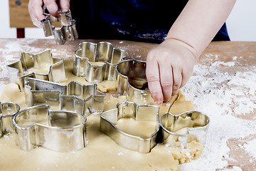 Image showing making cookies on wooden desk