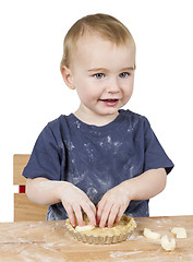 Image showing child making cookies