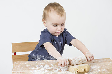 Image showing child making cookies