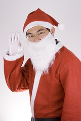 Image showing Asian Santa Claus Say Hi