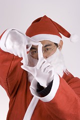 Image showing Asian Santa Claus With Framing Gesture