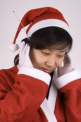 Image showing Santa Claus Listening Music