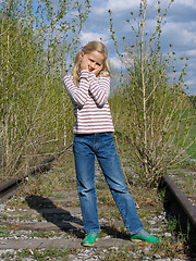 Image showing Girl on the railroad