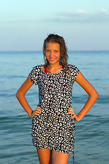 Image showing smiling teen girl in wet dress