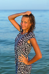 Image showing attractive teen girl in wet dress