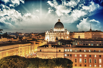 Image showing Buildings of Rome with Vatican St Peter Dome in background - sun