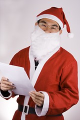 Image showing Santa Claus with Check List