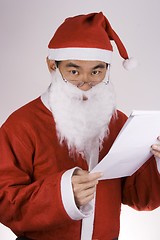 Image showing Santa Claus with Check List