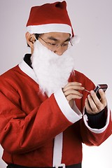 Image showing Santa Claus Dialing