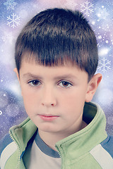 Image showing studio portrait of young boy on christmas background