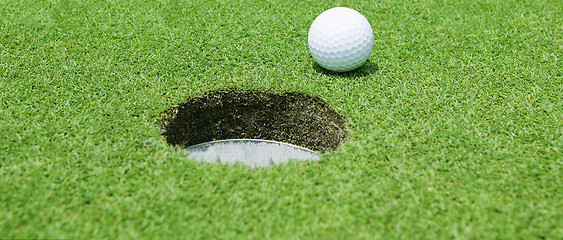 Image showing Golf ball near the hole