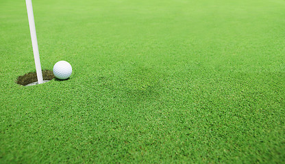 Image showing Golf ball near the hole