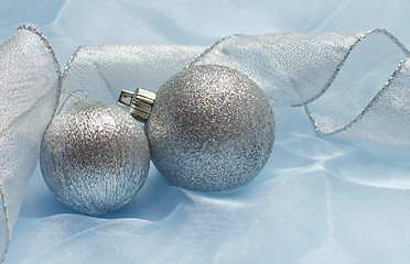 Image showing christmas ball on blue silk