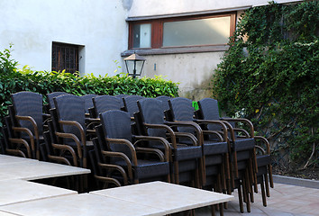 Image showing Stack of Chairs in the Courtyard Restaurant